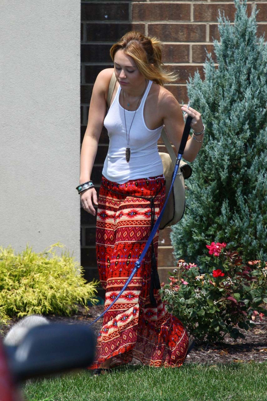 Miley Cyrus fucking sexy and hot bra peek paparazzi photos on street #75292995