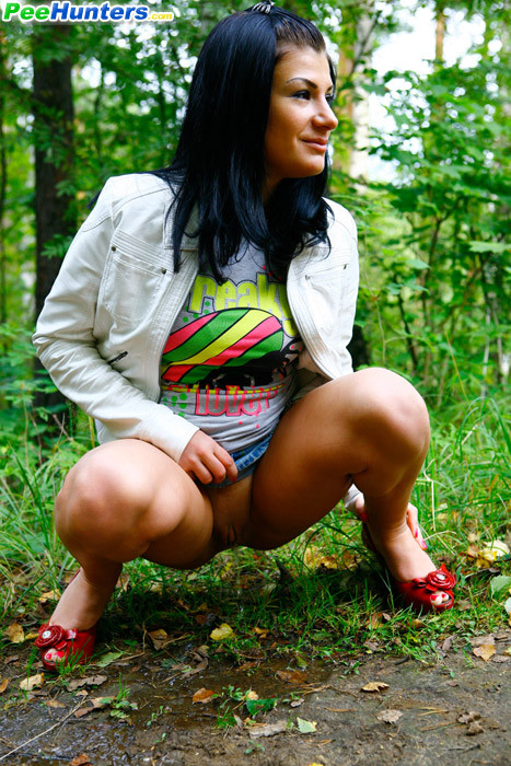 Hot brunette shows smoothie while pissing alfresco #78691126