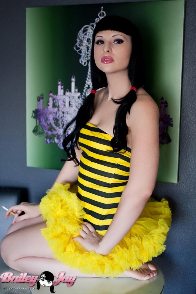 Irresistible TS goddess Bailey Jay smoking and posing in a bumbleebee costume #79202195