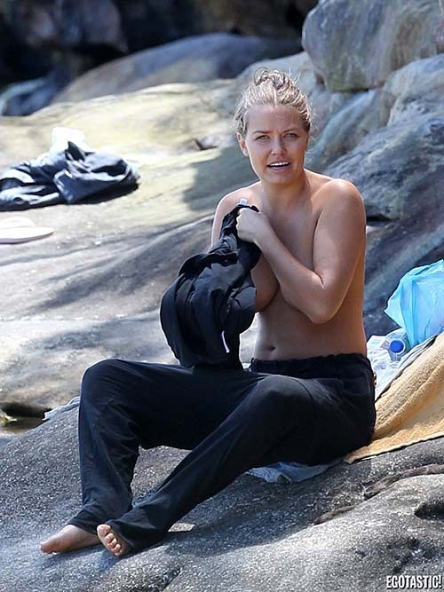 Lara Bingle topless sunbathing on beach paparazzi photos #75278403