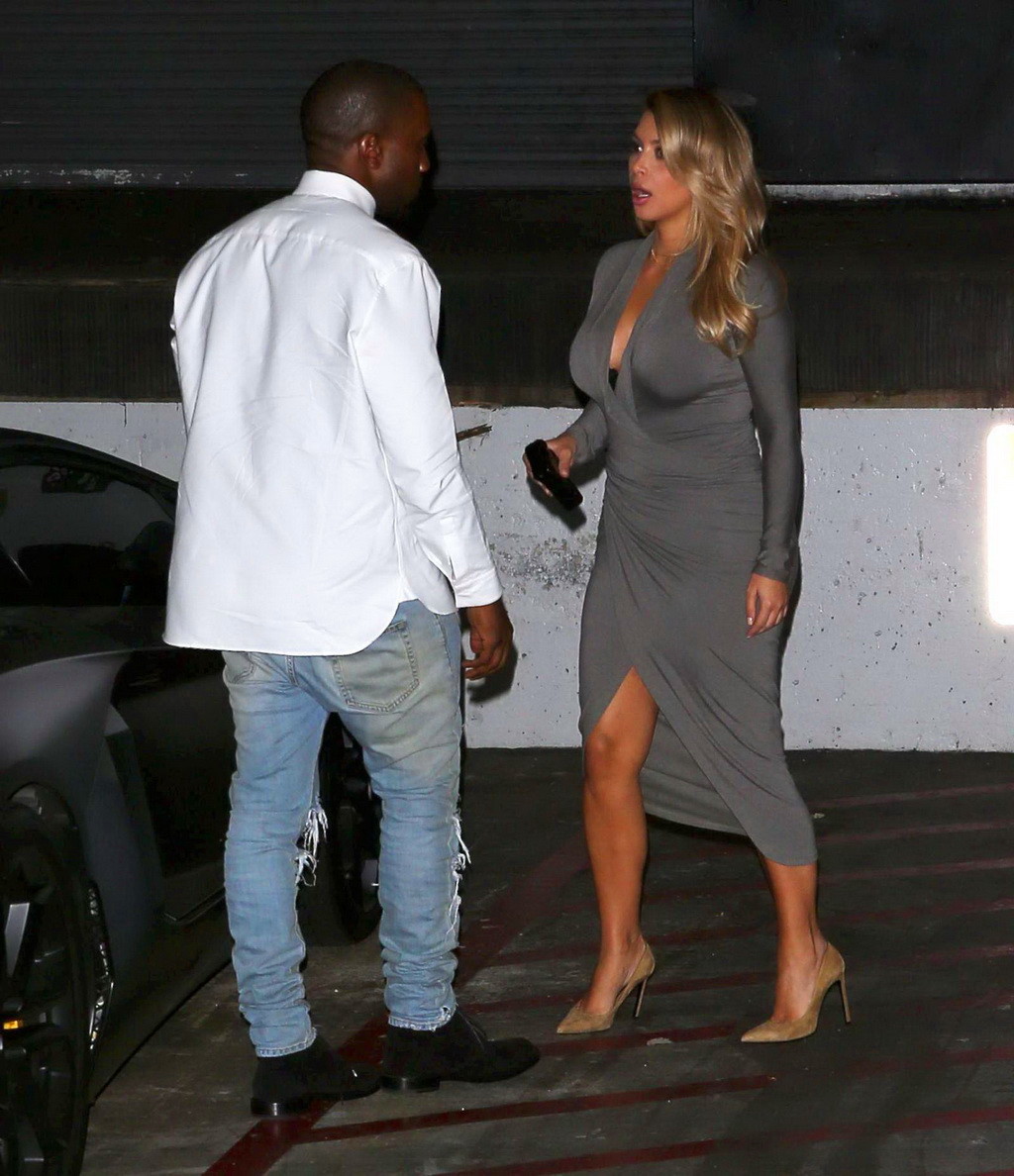Kim Kardashian showing big cleavage in a high slit gray dress outside Dash bouti #75215971