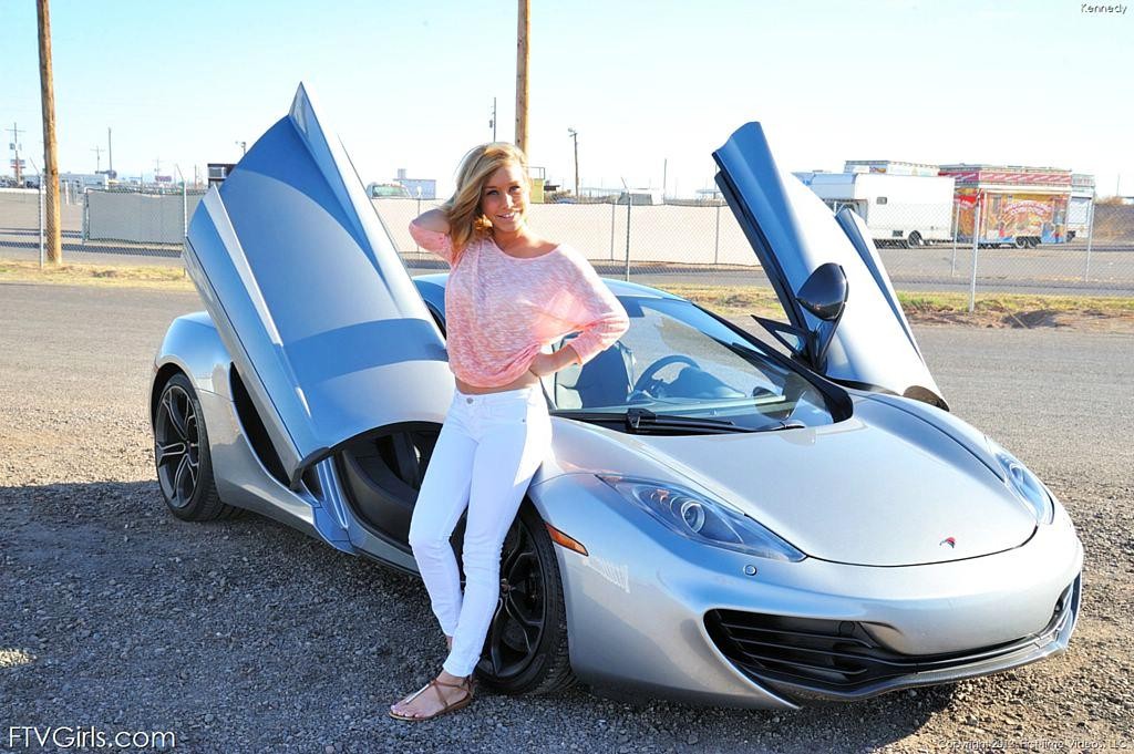 Pretty Kennedy Leigh strips naked in hot sports car #70974884