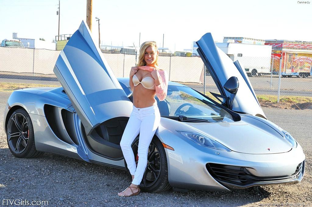 Pretty Kennedy Leigh strips naked in hot sports car #70974910