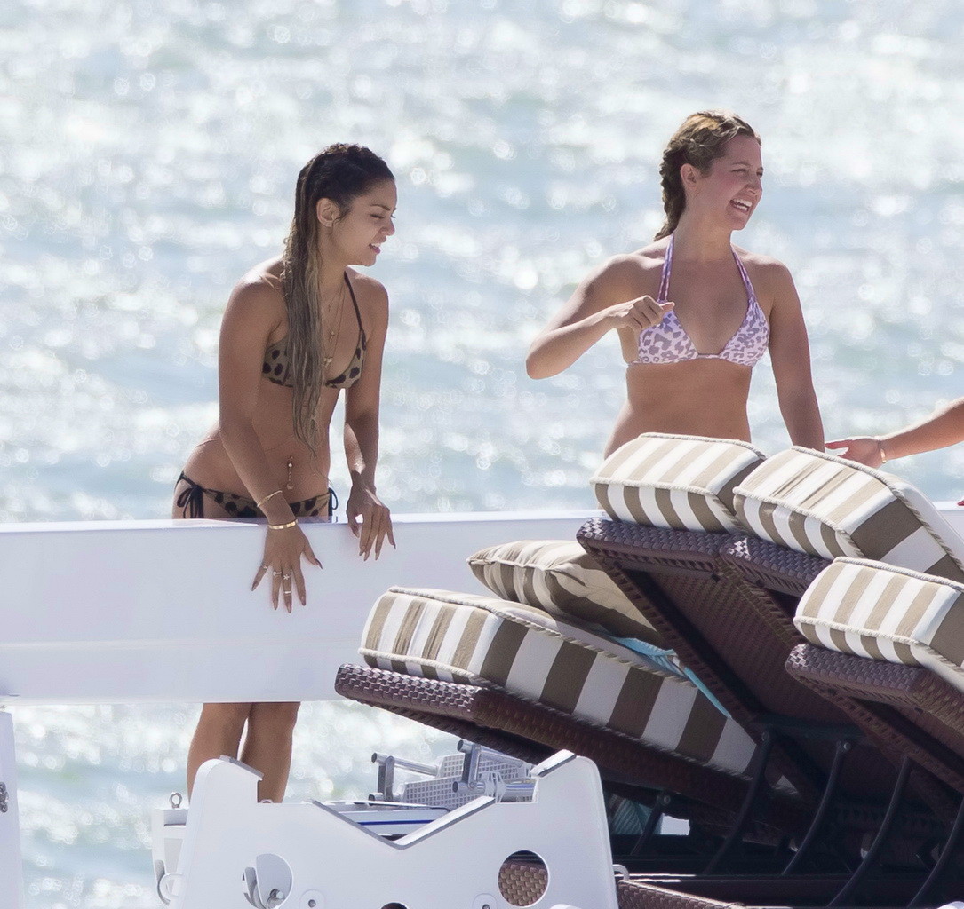 Vanessa Hudgens and Ashley Tisdale wearing skimpy animal print bikinis on the ya #75196283