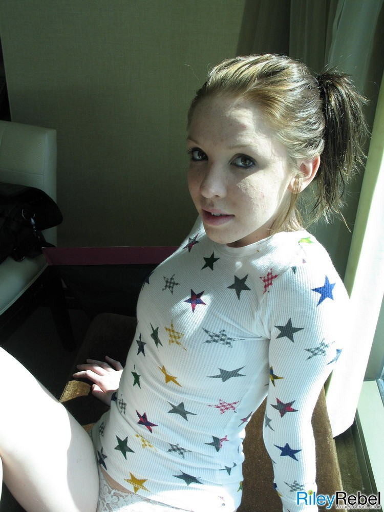 Eighteen year old strips in her hotel room window #78648144