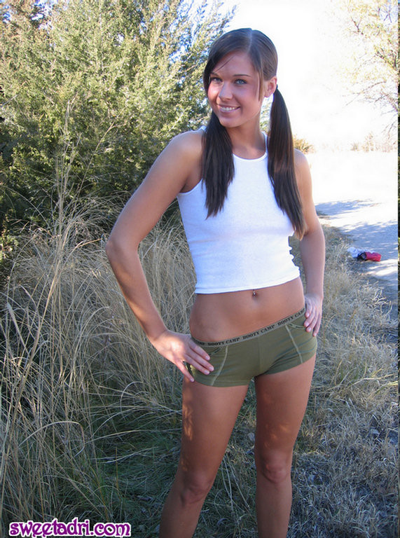 SweetAdri on a trail with a wife beater and booty shorts on #67827926