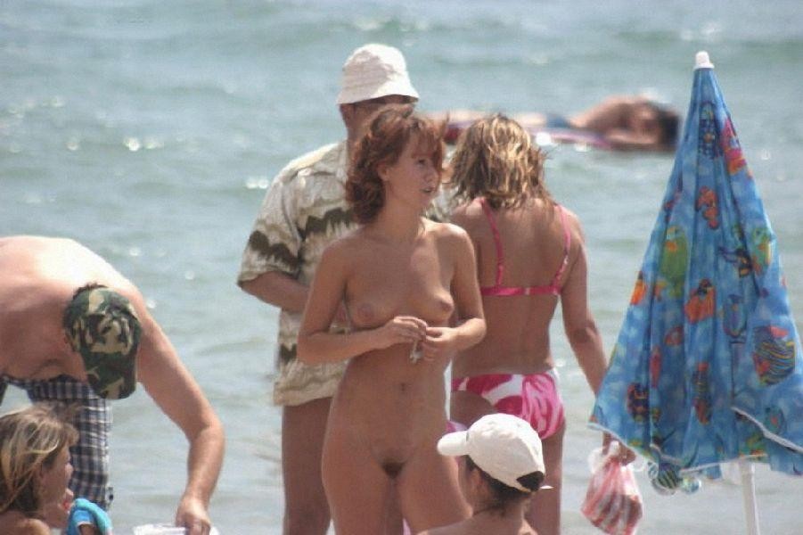 Hot Russian nudist strips her bikini off here #72256124