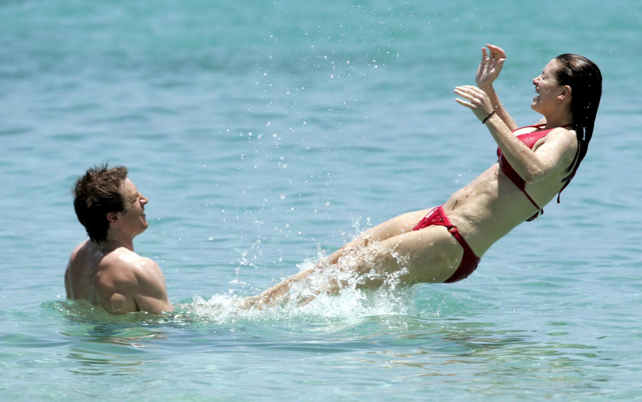 Kirsty Gallacher busty showing hard pokies in skimpy red bikini at some Caribbea #75173527