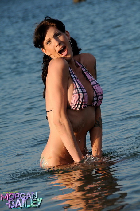 Morgan Bailey frolicks in the ocean waters #79232093