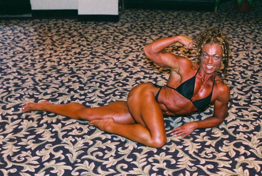 female bodybuilders posing and in action #76491410