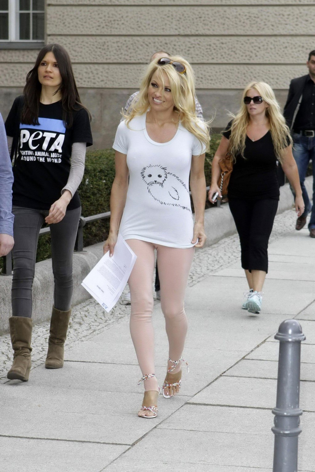 Pamela Anderson shows cameltoe wearing a skin colored tights in Berlin #75265374