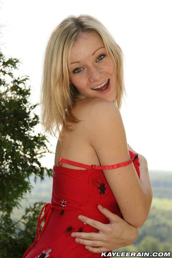 Gorgeous blonde nineteen year old flashing and posing outdoors #78611212