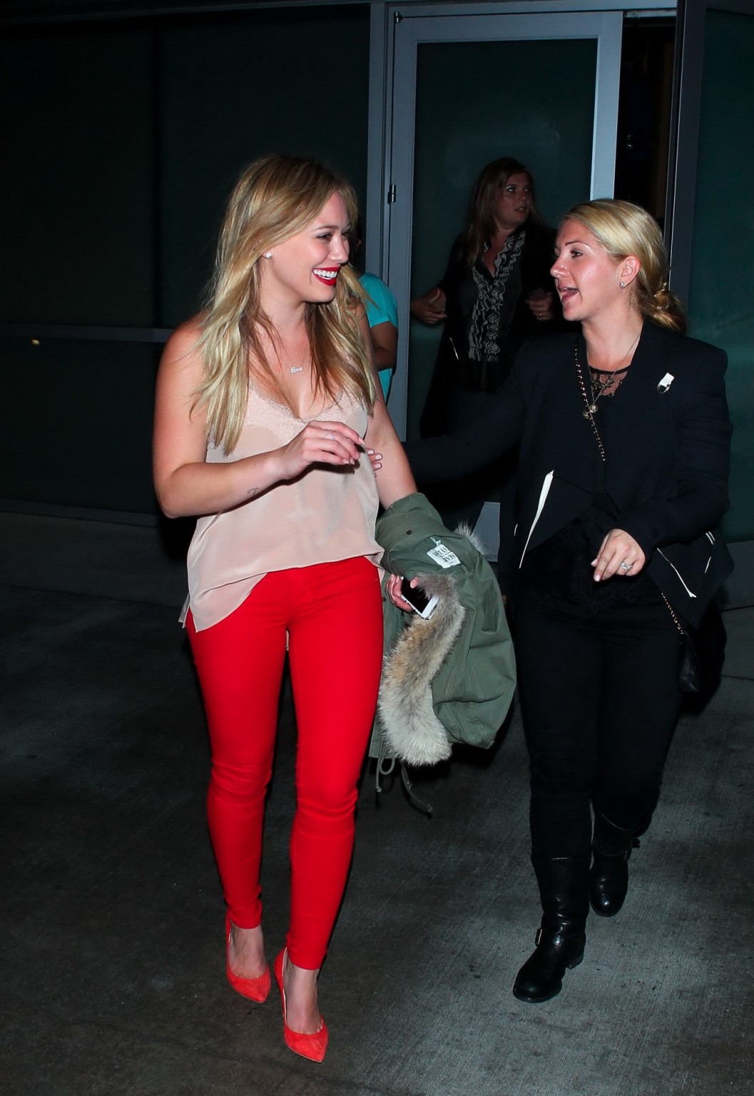 Hilary Duff wearing tank top and red tights leaving Pink concert at the Staples  #75215886