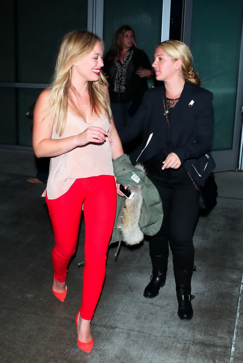 Hilary Duff wearing tank top and red tights leaving Pink concert at the Staples  #75215893