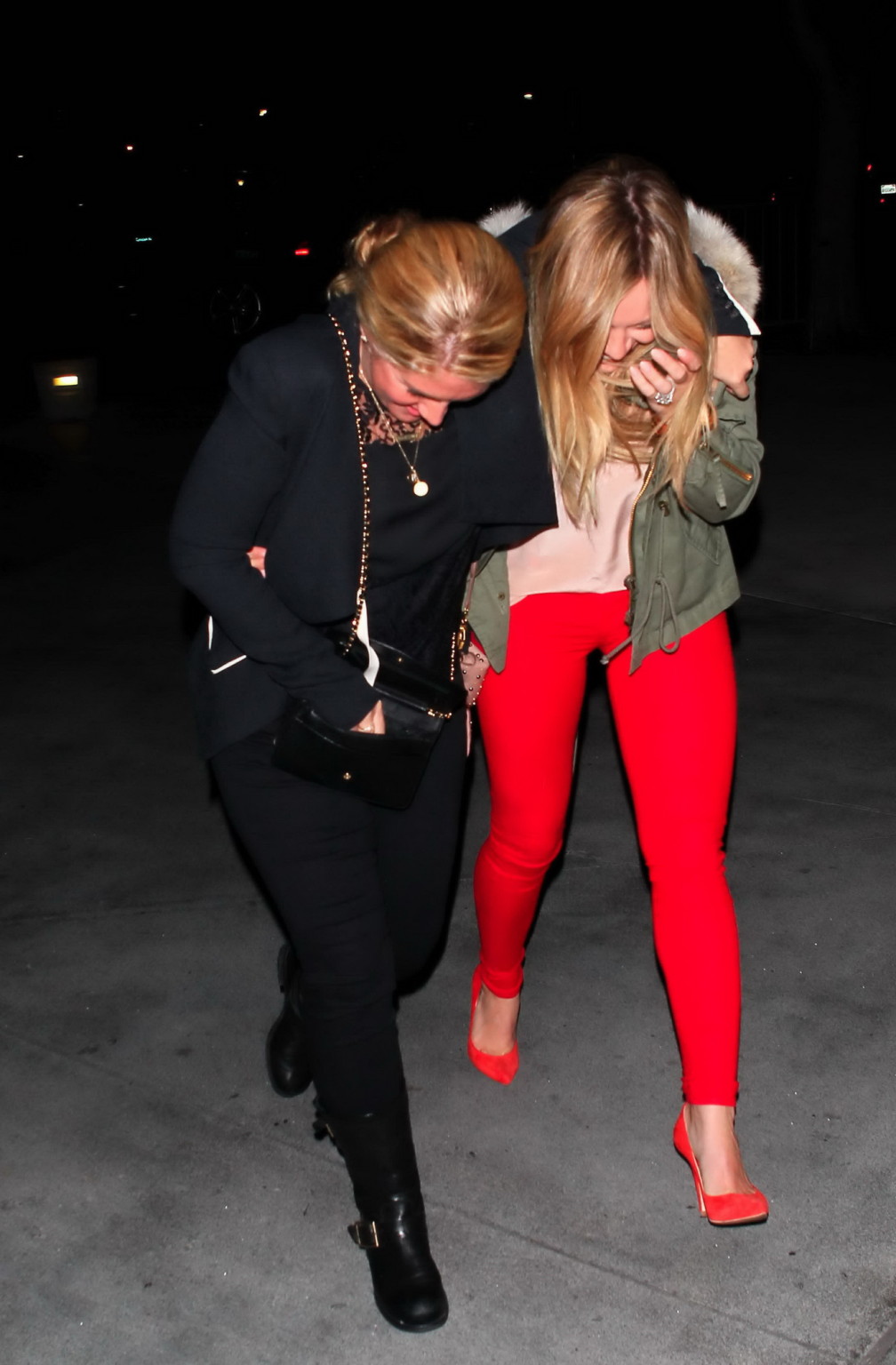 Hilary Duff wearing tank top and red tights leaving Pink concert at the Staples  #75215896