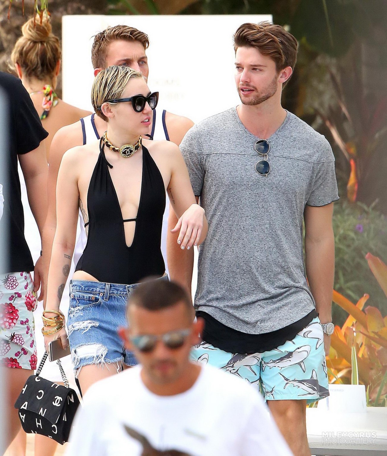 Miley Cyrus wearing swimsuit and hotpants at a pool in Miami #75178799