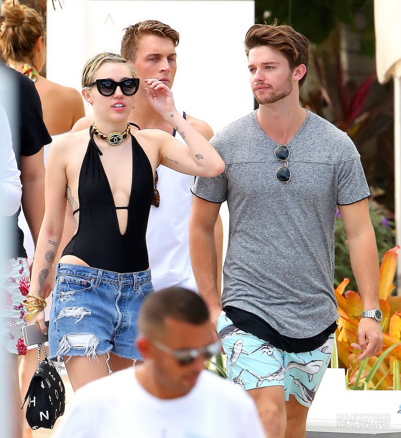 Miley Cyrus wearing swimsuit and hotpants at a pool in Miami #75178802