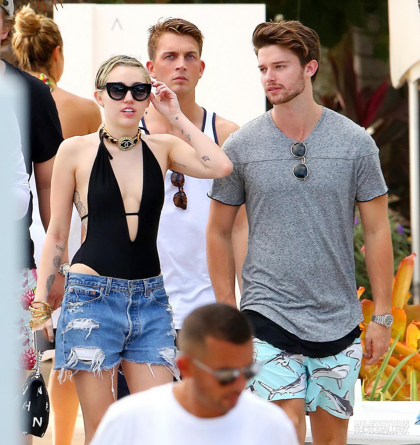 Miley Cyrus wearing swimsuit and hotpants at a pool in Miami #75178803