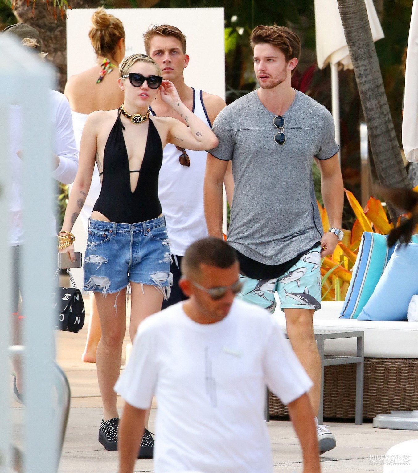 Miley Cyrus wearing swimsuit and hotpants at a pool in Miami #75178807