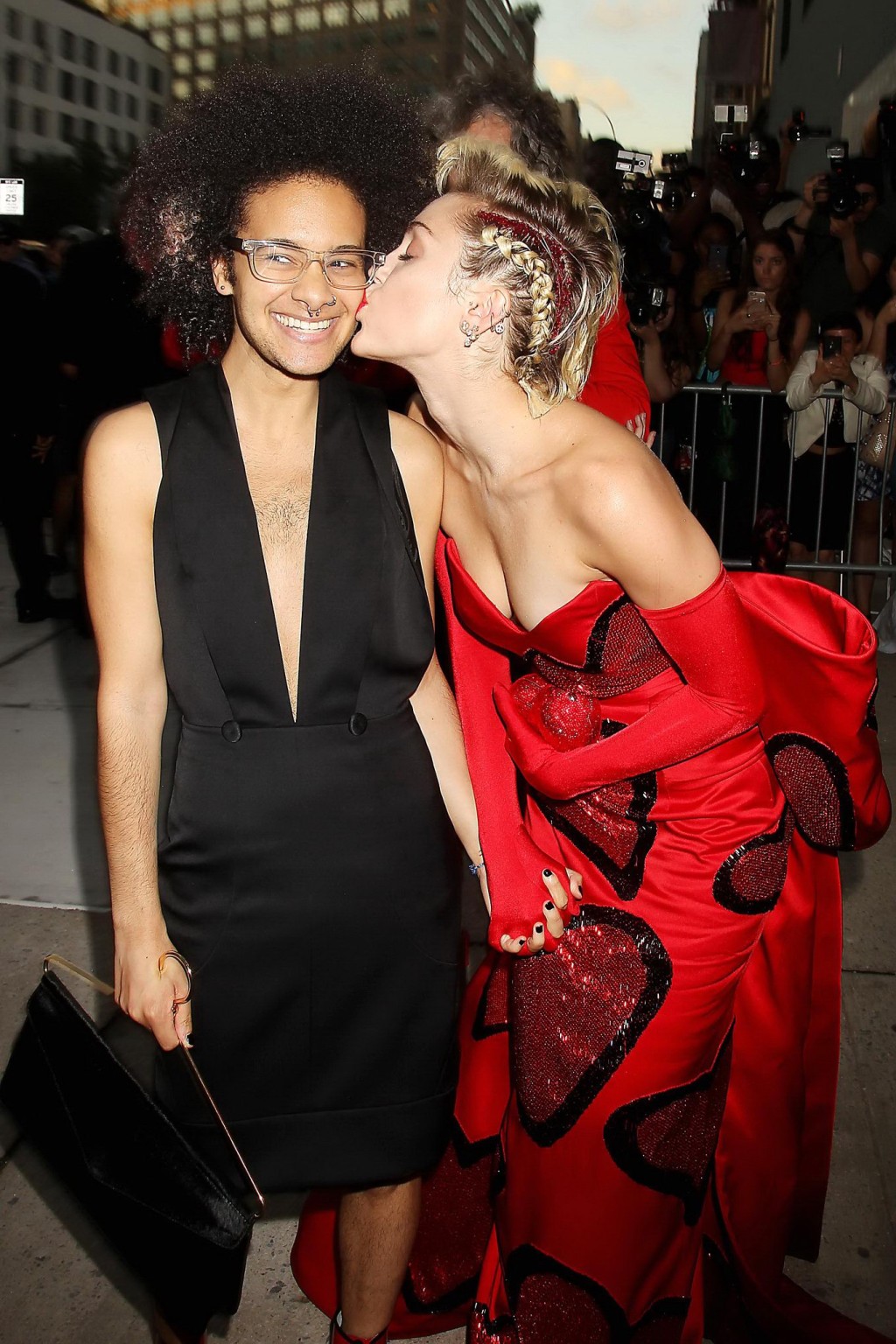 Miley Cyrus busty in a strapless red dress kissing a tranvestite #75160943