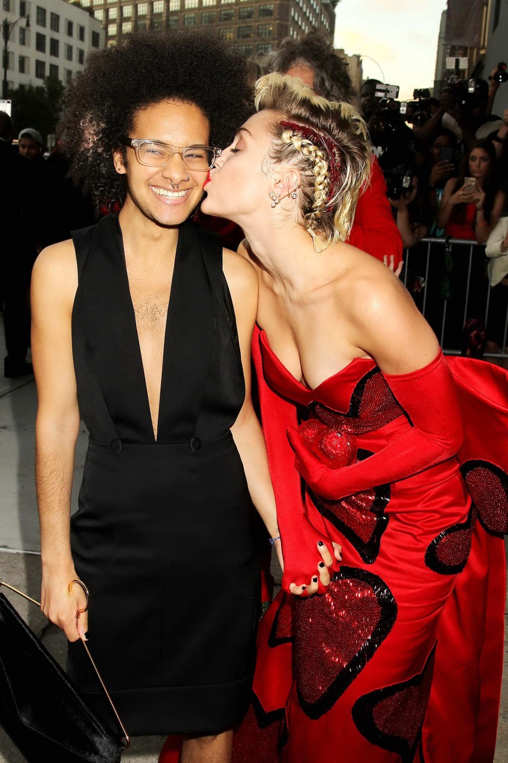 Miley Cyrus busty in a strapless red dress kissing a tranvestite #75160950