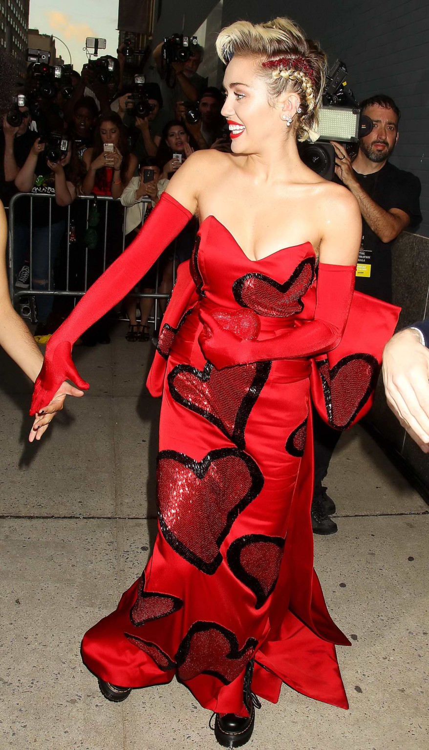 Miley Cyrus busty in a strapless red dress kissing a tranvestite #75161100