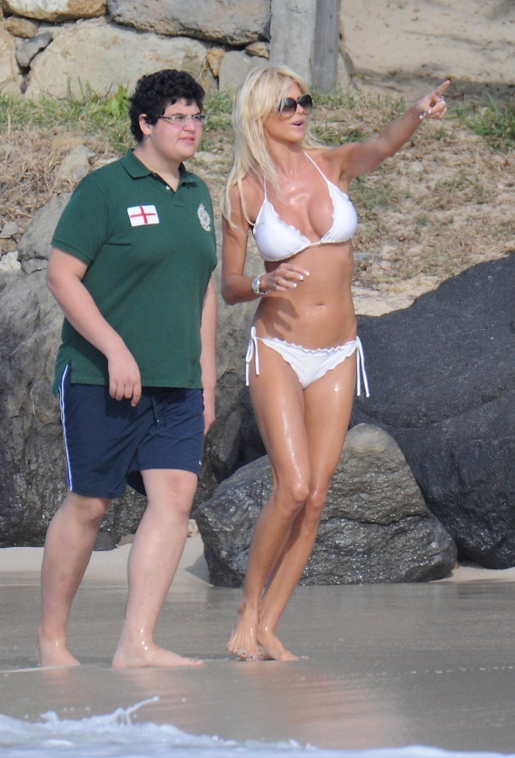 Victoria Silvstedt busty wearing skimpy white bikini on the beach in St. Barts #75322651