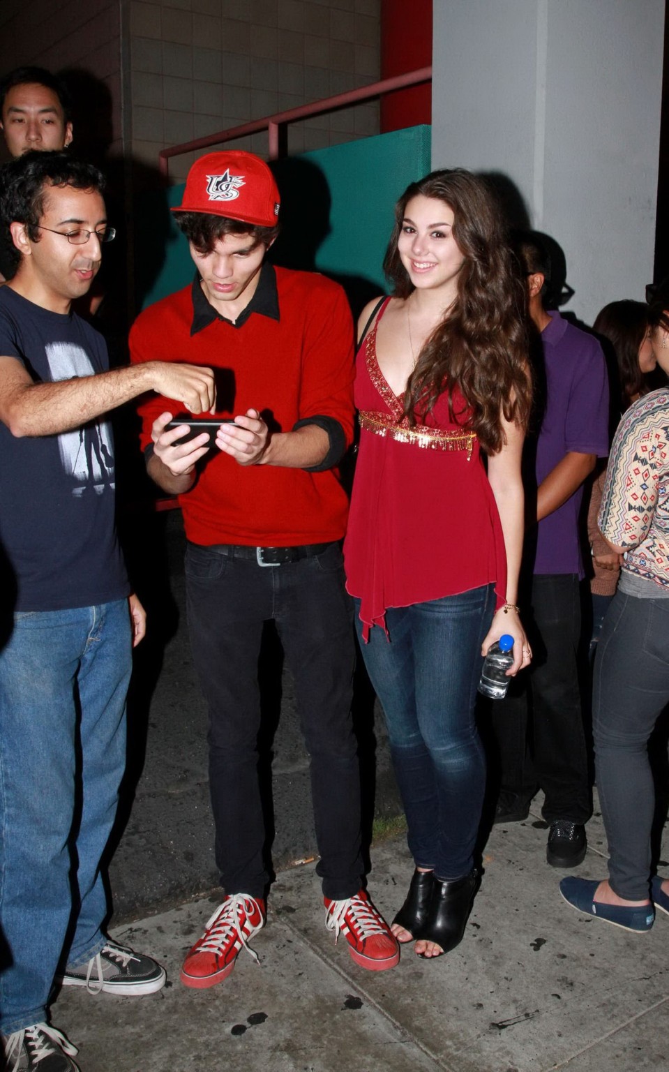 Kira Kosarin showing huge cleavage in a hot red top and jeans while leaving the  #75183092