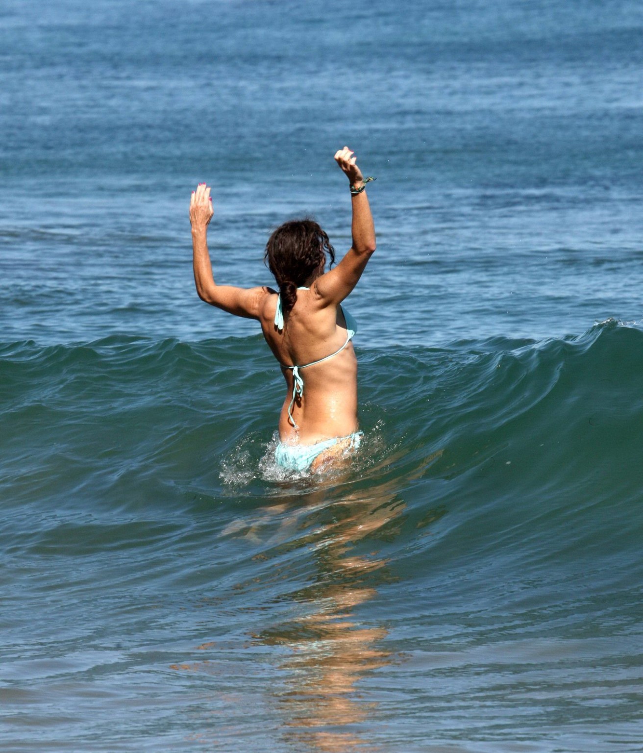 Minnie Driver wearing sky blue bikini on the beach in Malibu #75289554