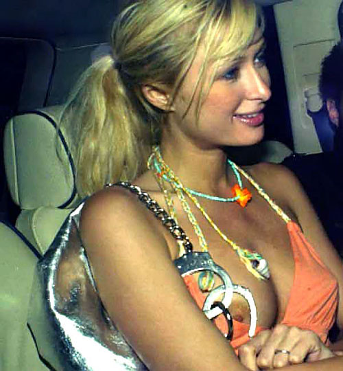 Paris Hilton nipple slip and upskirt in car paparazzi pictures and showing her t #75386928
