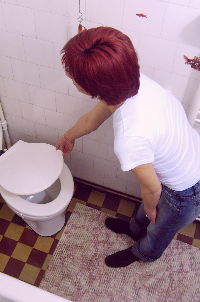 Voyeur shots of sexy redhead caught peeing on hidden toilet cam #71653818
