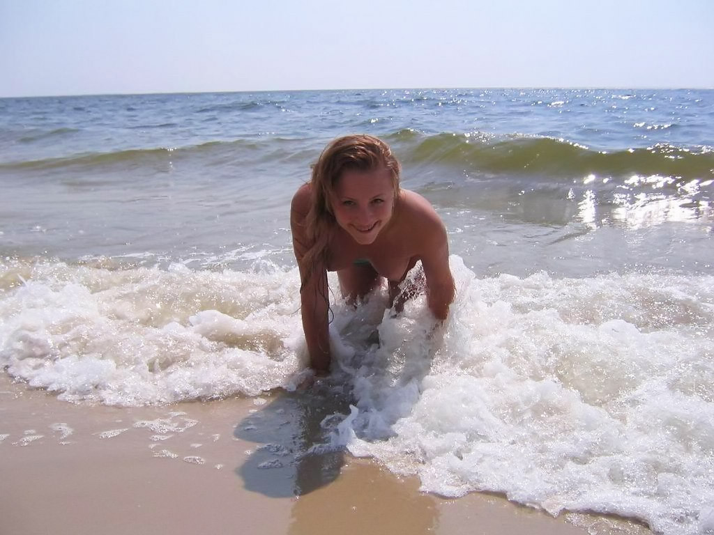 Assed teens play together at a public beach #70293504