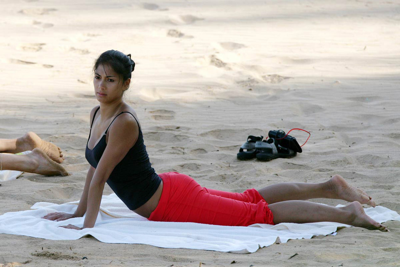 Nicole Scherzinger doing yoga on the beach #75312541