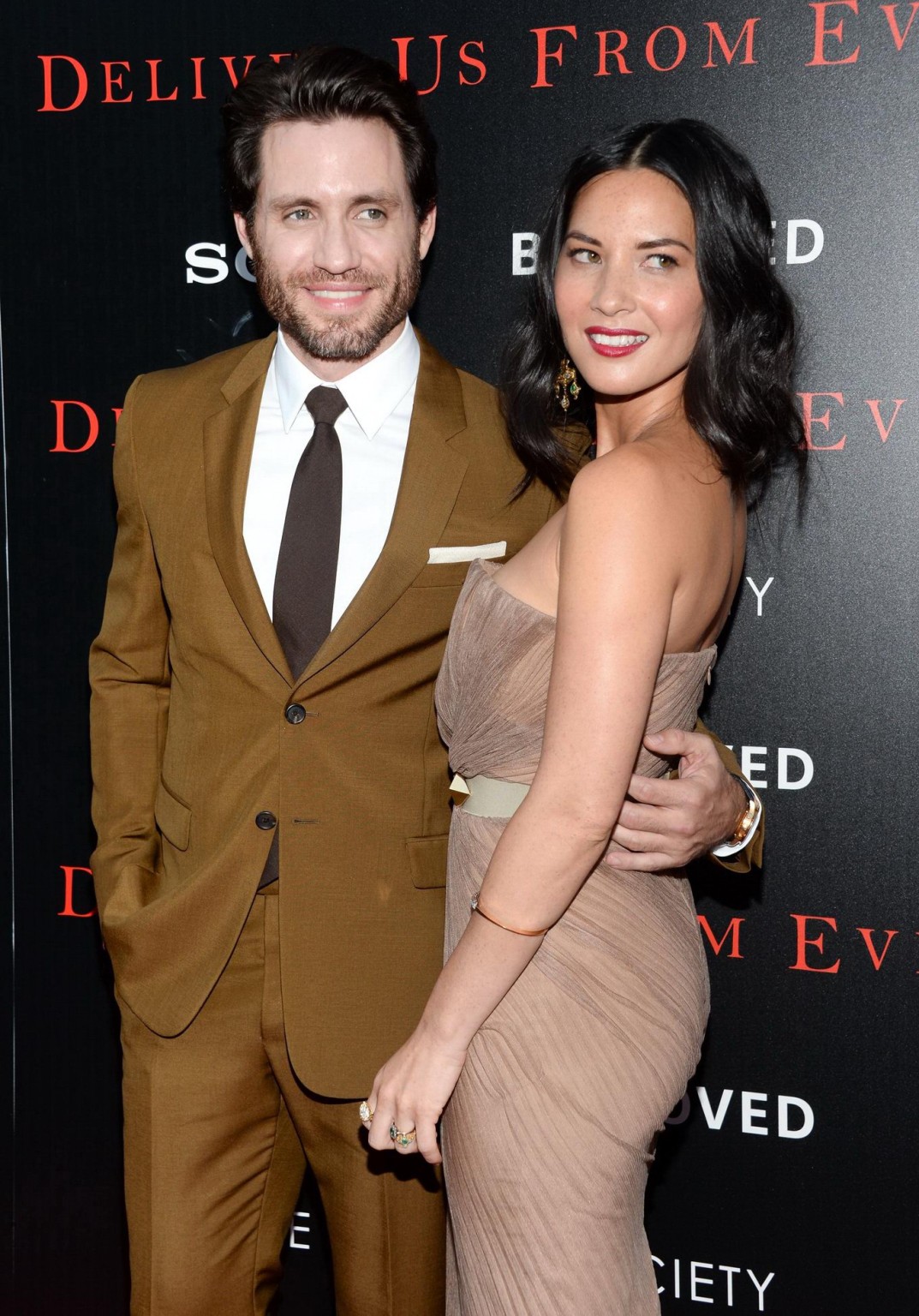 Olivia Munn busty wearing a strapless dress at Deliver Us From Evil screening in #75192922