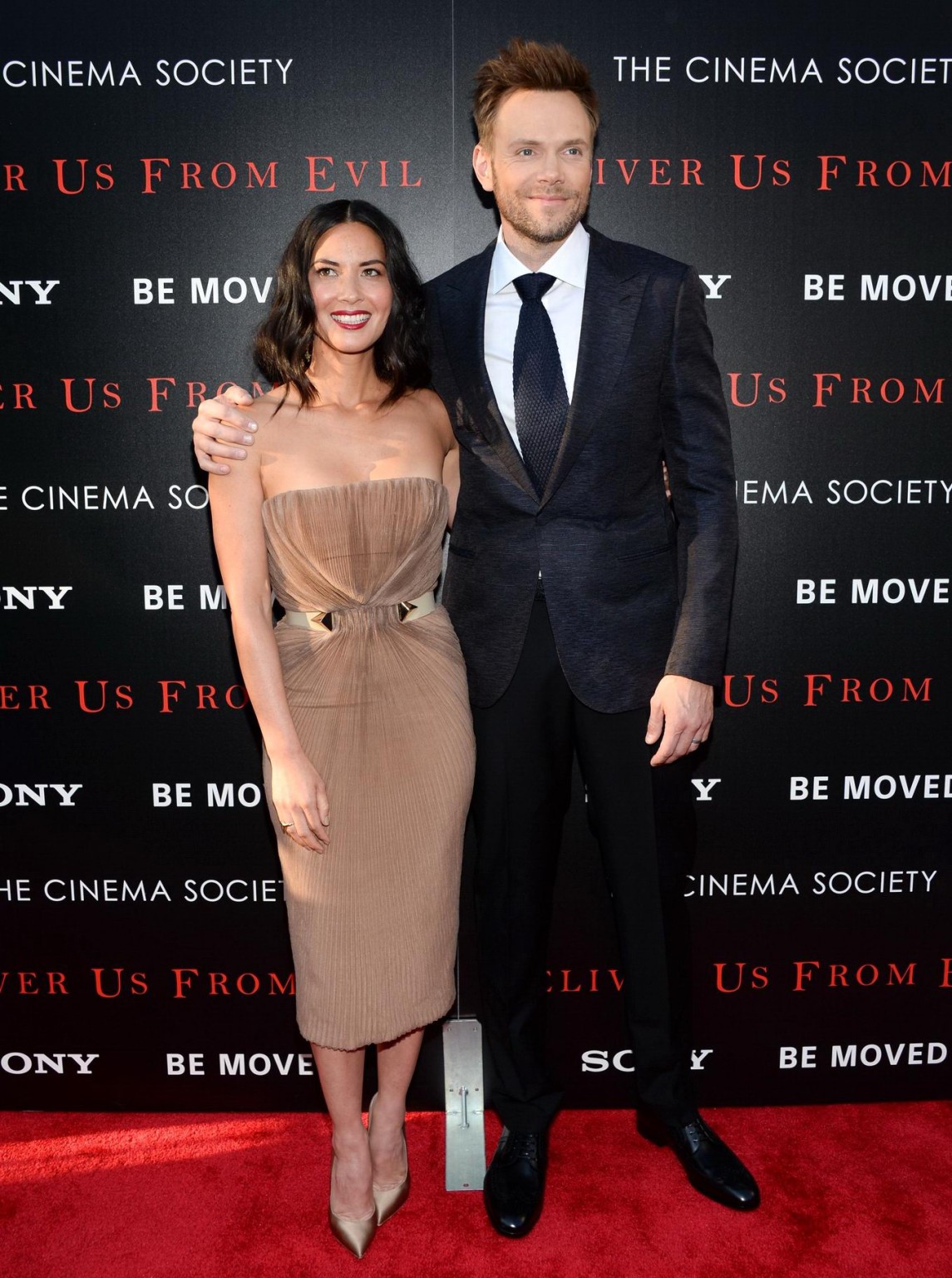 Olivia Munn busty wearing a strapless dress at Deliver Us From Evil screening in #75192941