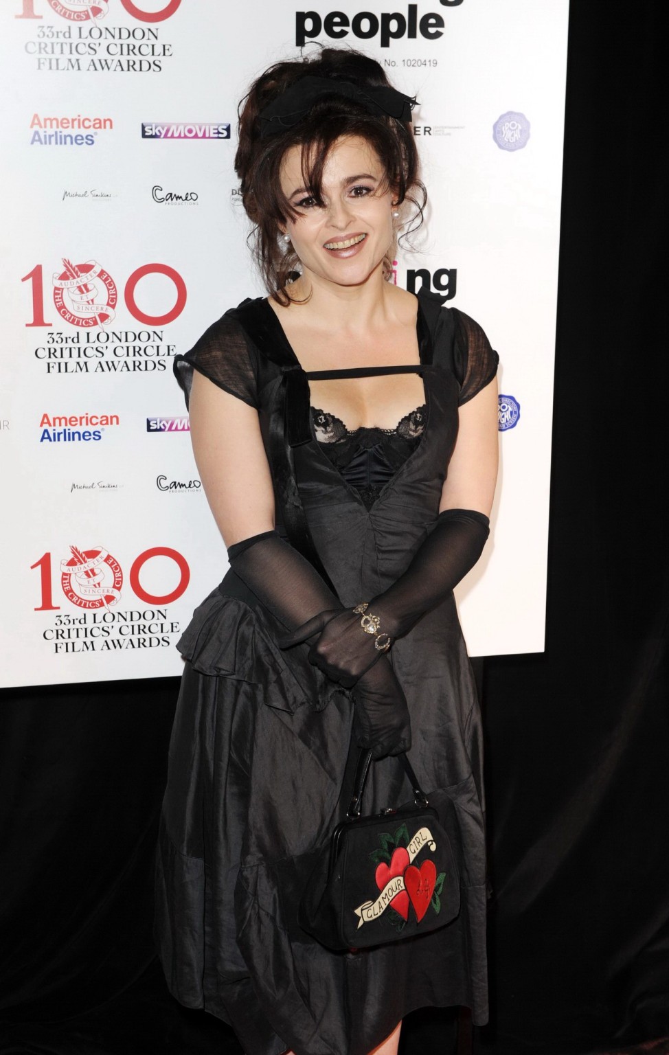 Helena bonham carter corsetto picco indossando un abito profondo v scissione al film di Londra 
 #75243120
