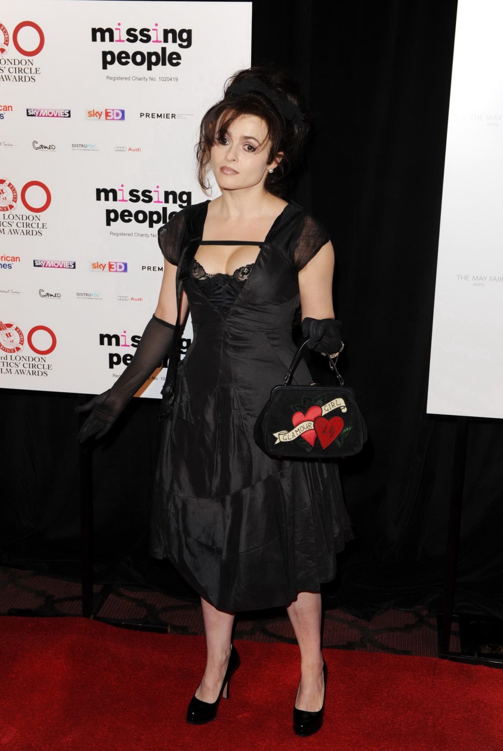 Helena bonham carter corsetto picco indossando un abito profondo v scissione al film di Londra 
 #75243131