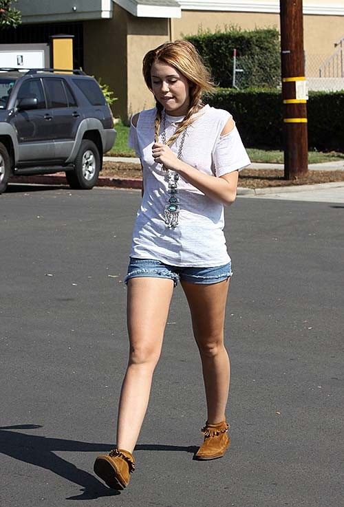 Miley Cyrus sexy hard nipples and sexy legs paparazzi photos #75279536