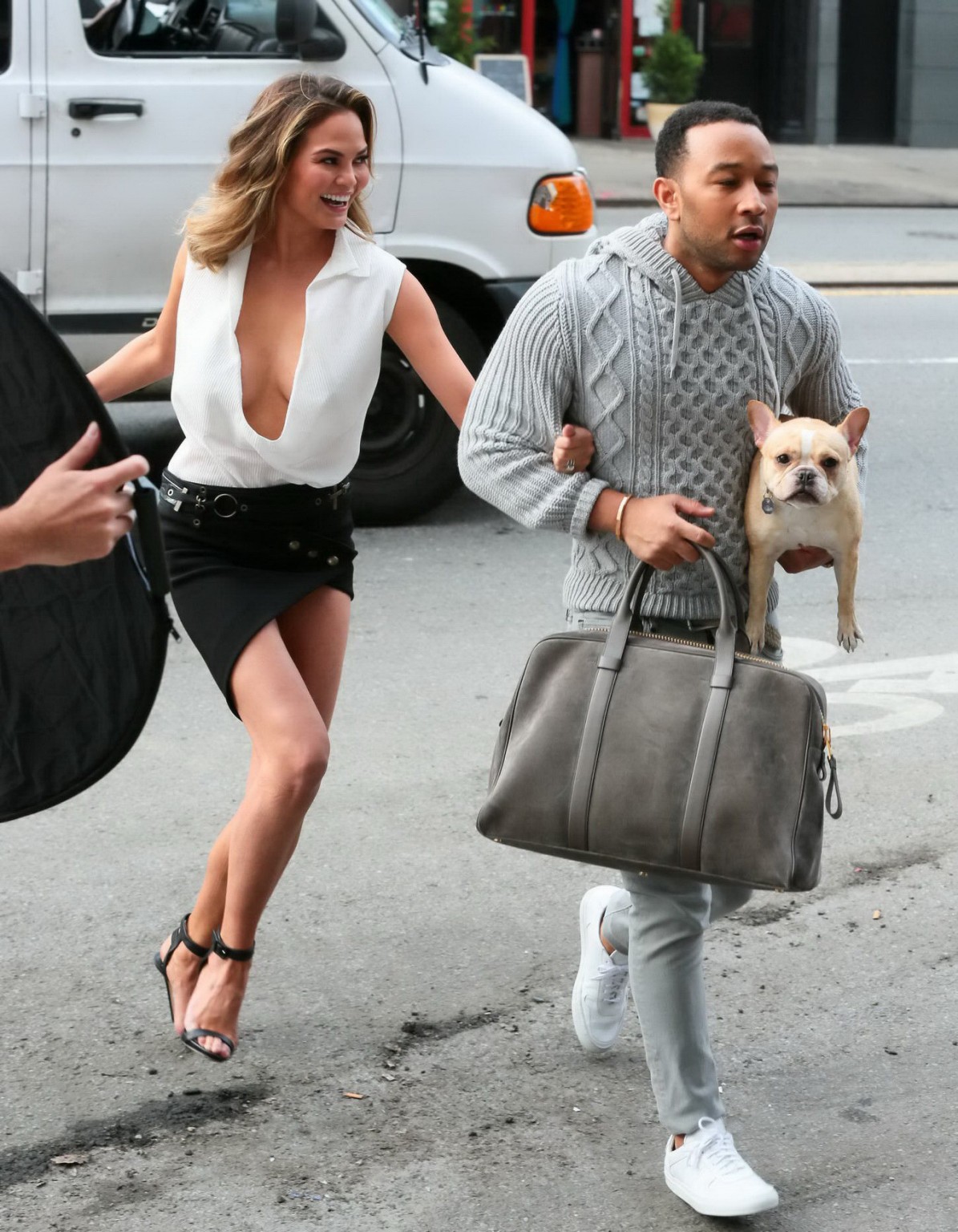 Christine Teigen cleavy and leggy making out with John Legend during a fashion p #75179777