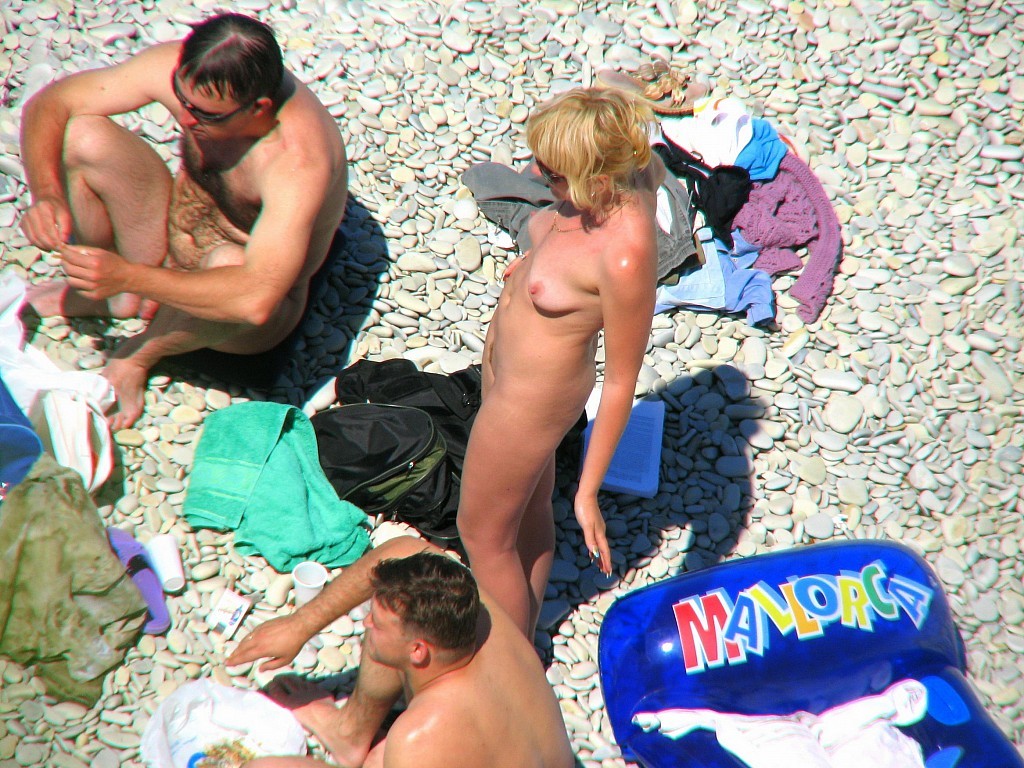 Photos nues de voyeurisme sur la plage
 #67280602