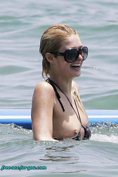 Paris Hilton posing sexy and nipple slip paparazzi pictures #75428672