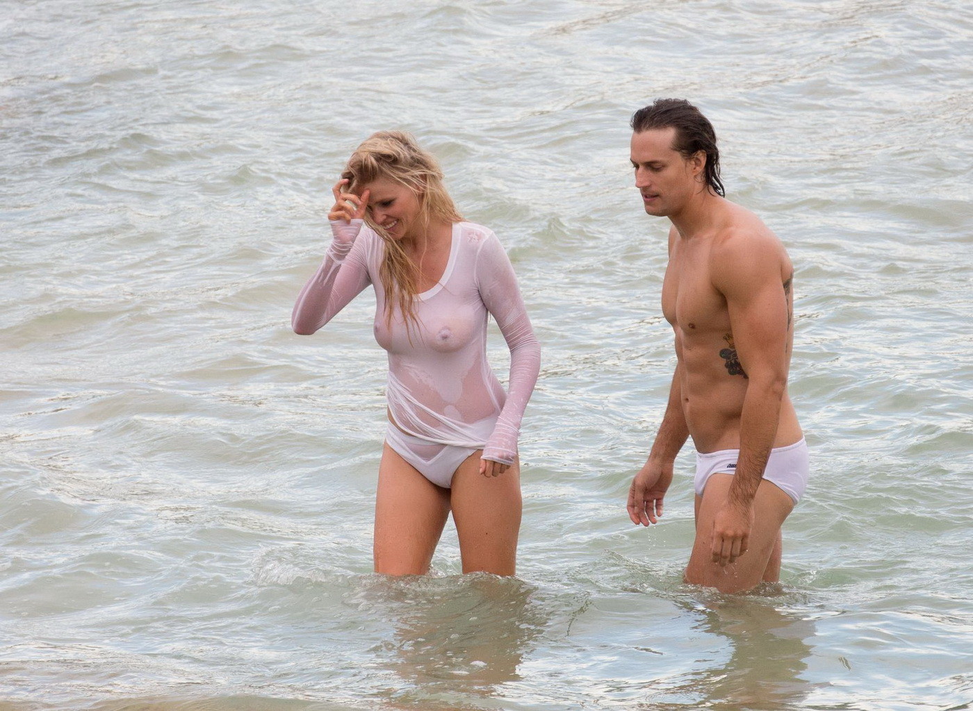 Lara Stone showing boobs in wet top and bikini bottom #75140001