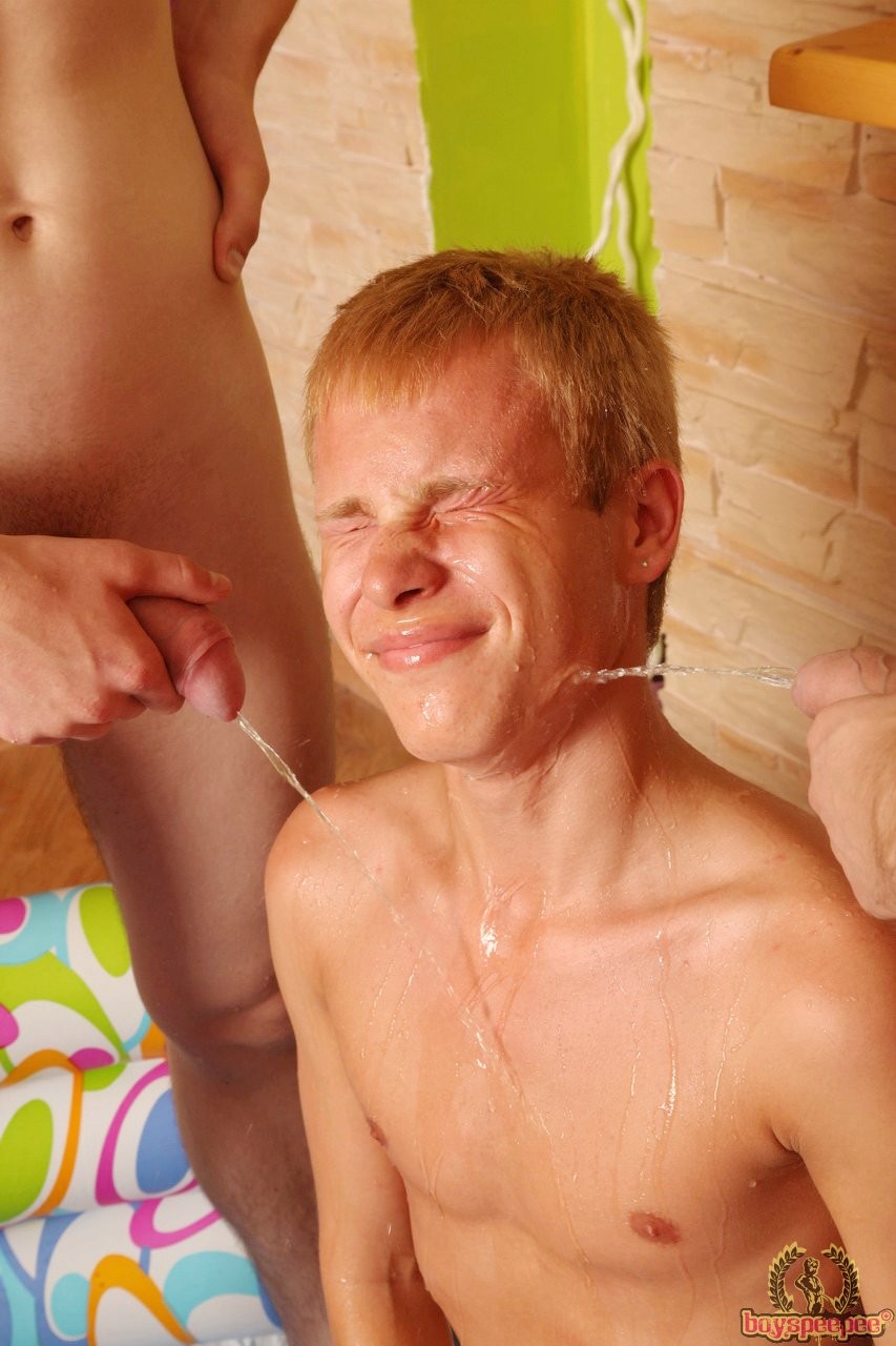 Blond twink getting pissed on by two friends #76929161