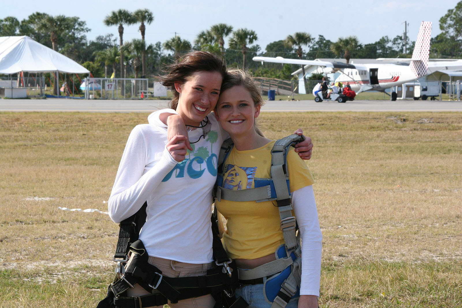 Brooke and Sam jump out of a plane #67792483