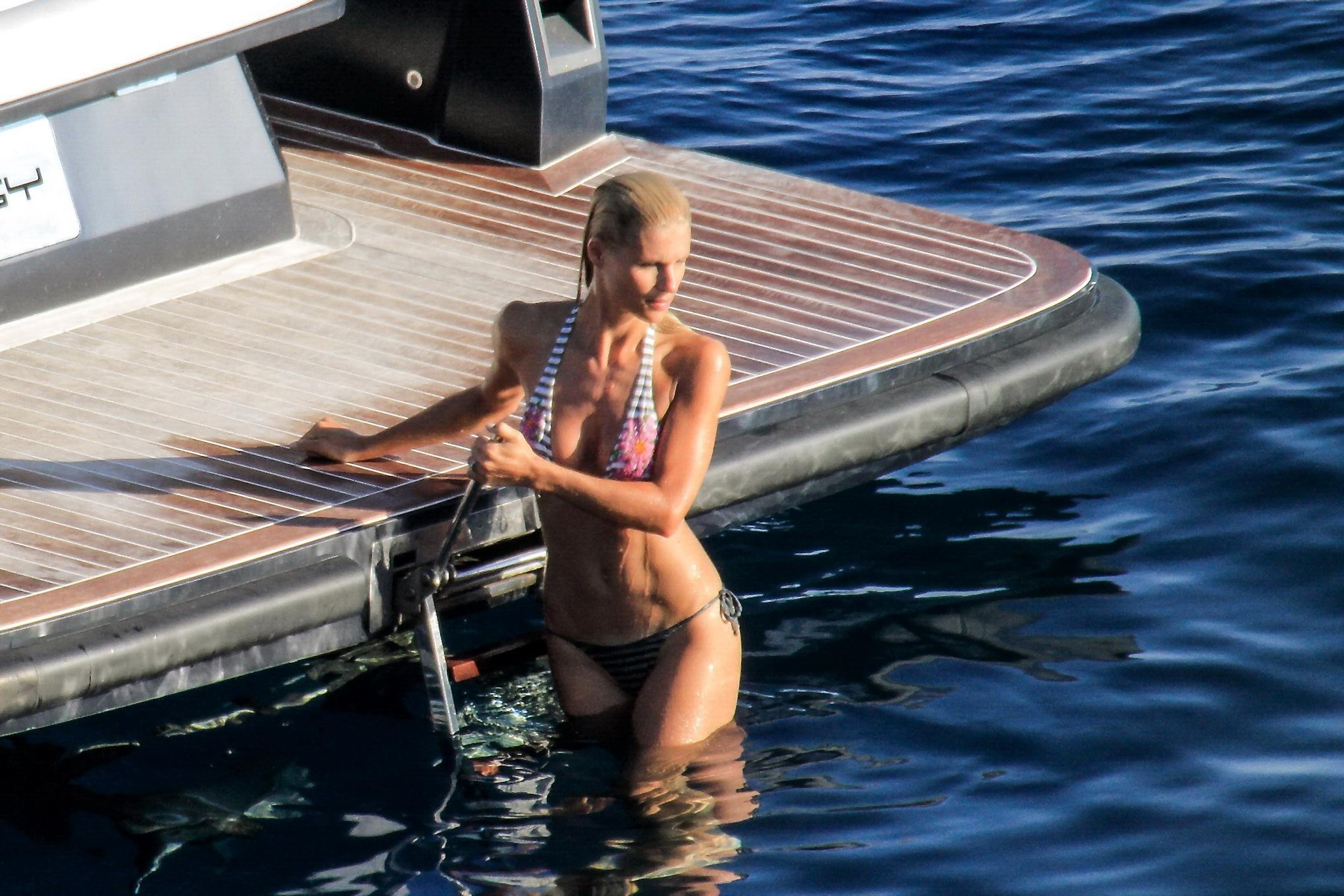 Michelle Hunziker wearing a thong bikini on a yacht in Elba #75254098