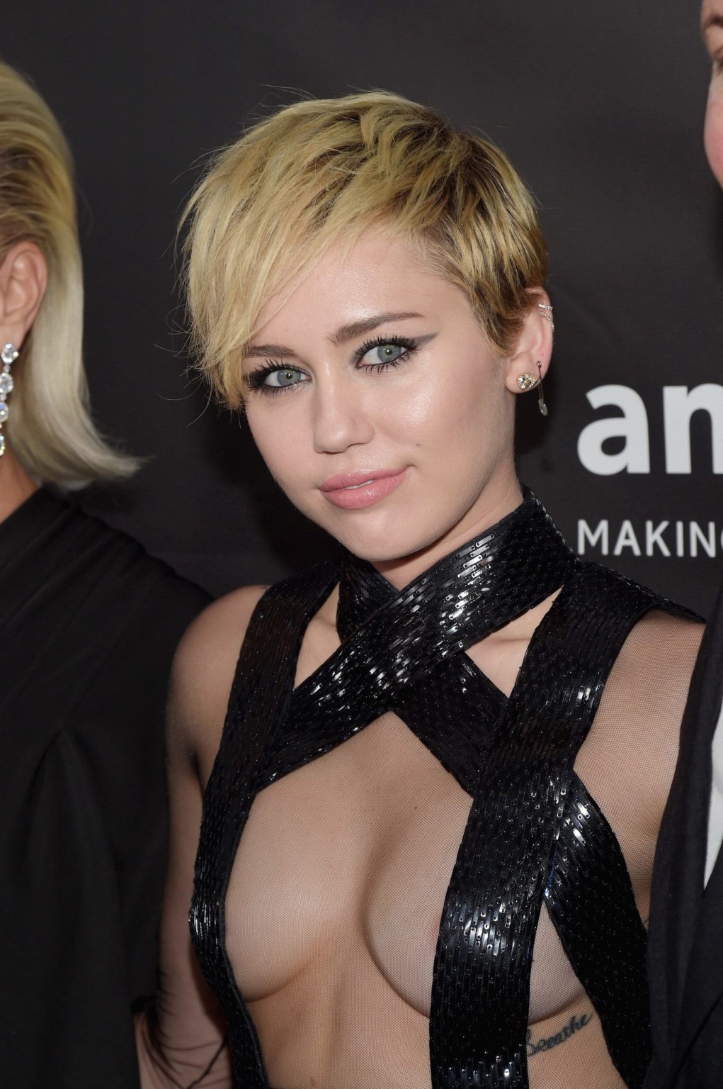 Miley Cyrus seethru covering only nipples at amfAR LA Inspiration 2014 Gala in H #75182747