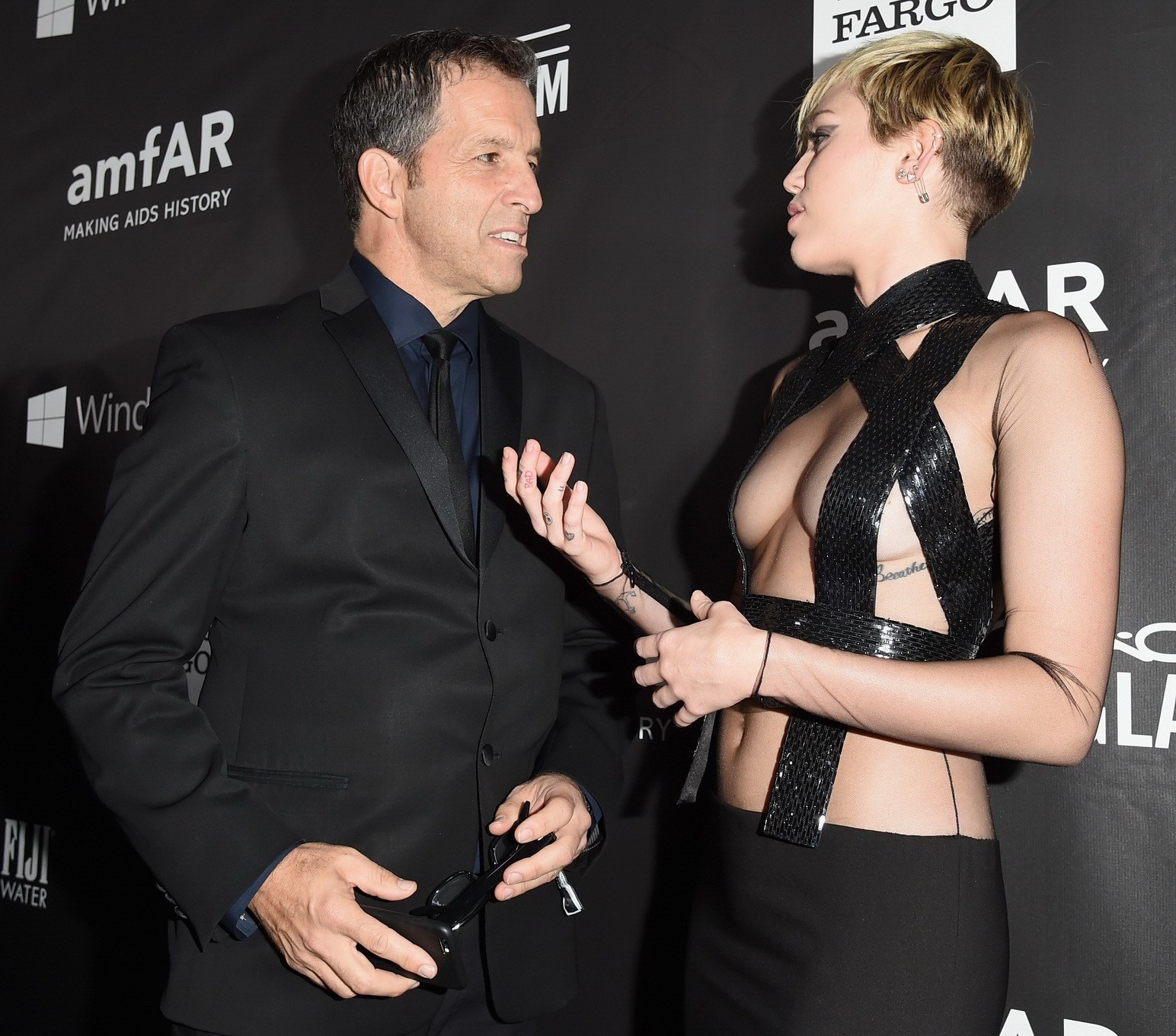 Miley Cyrus seethru covering only nipples at amfAR LA Inspiration 2014 Gala in H #75182846