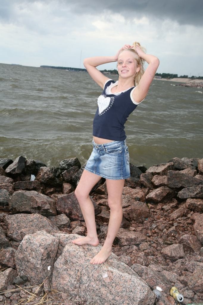 Tiny teen pulls aside panties to spread by sea #78658811