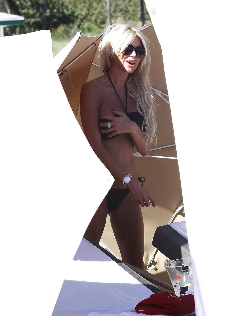 Vvictoria Silvstedt looking sexy in black bikini in Miami paparazzi pictures #75277561