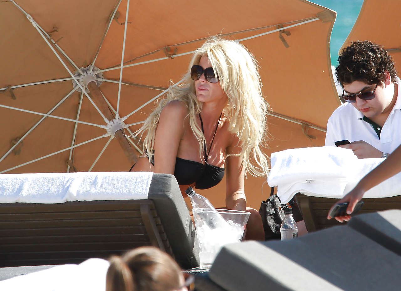 Vvictoria Silvstedt looking sexy in black bikini in Miami paparazzi pictures #75277614